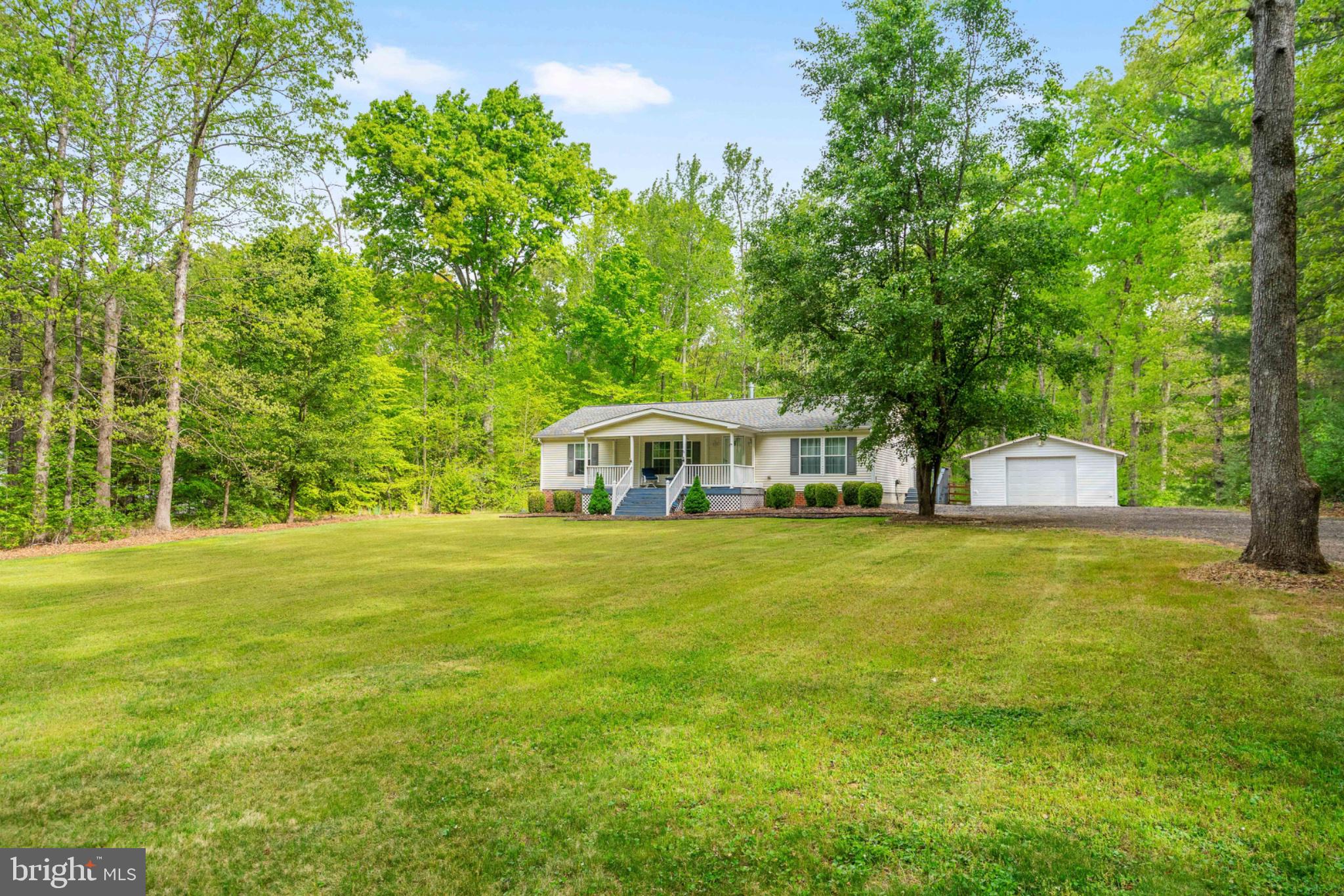 2319 Sizer Road Beaverdam, VA 23015 - Photo 60 of 61 a front view of a house with a garden