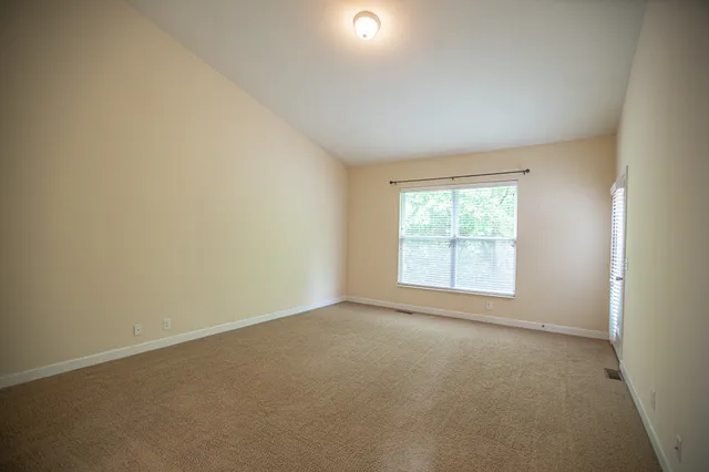 an empty room with a natural light