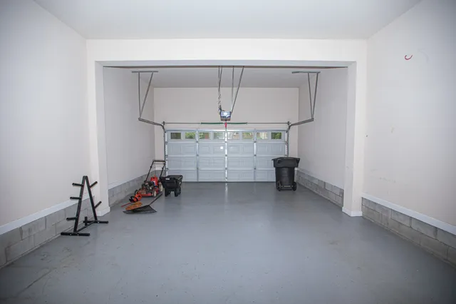 a view of balcony with wooden floor and fence