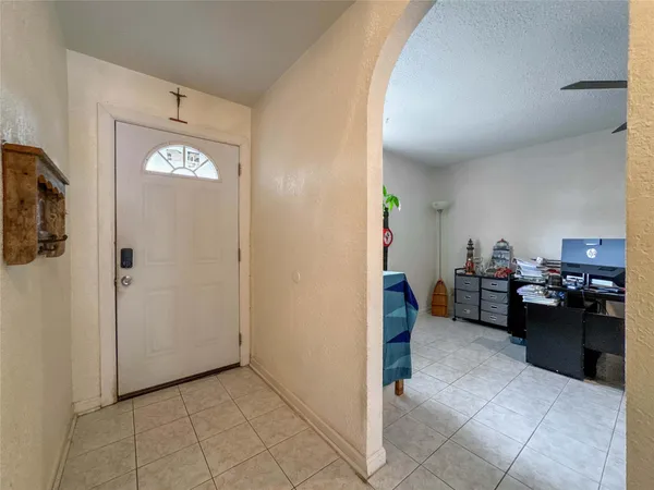 a view of a livingroom with furniture and windows