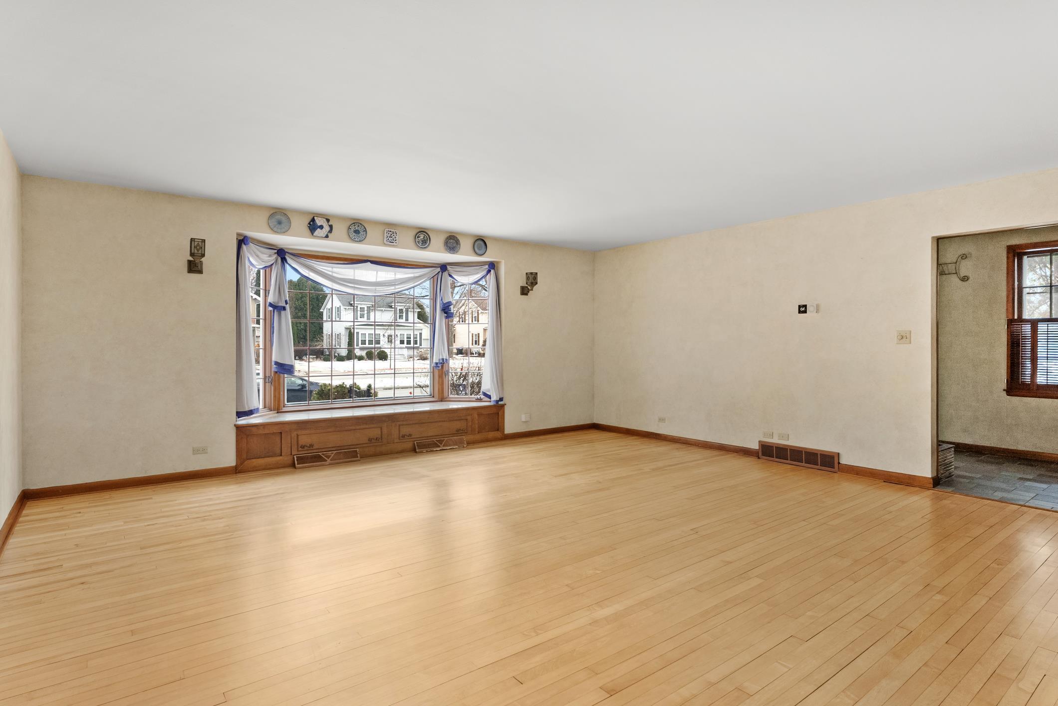 543 Roosevelt Road Kohler, WI 53044 - Photo 6 of 55 19' x 18'. Door to the right is to the Foyer,