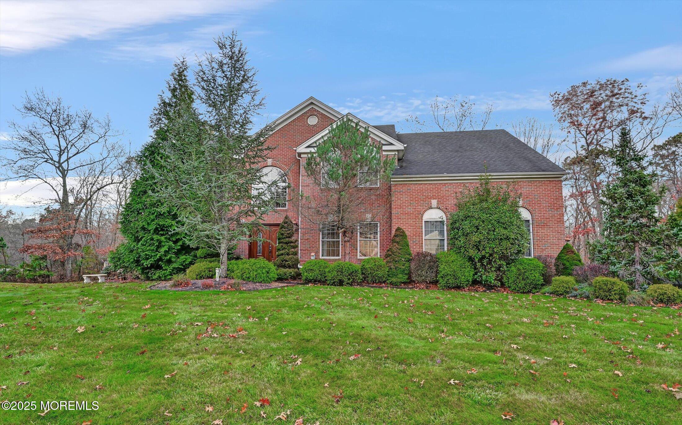 11 Craig Court Jackson, NJ 08527 - Photo 1 of 14 a front view of house with yard and green space
