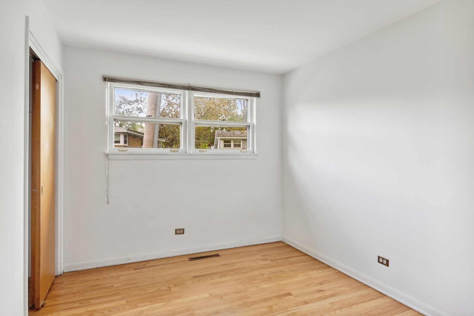 414 Shermer Road Glenview, IL 60025 - Photo 12 of 16 an empty room with a window