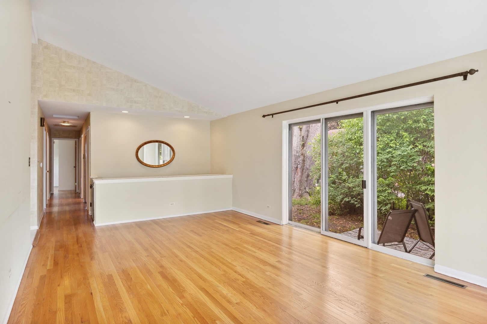 414 Shermer Road Glenview, IL 60025 - Photo 4 of 16 a view of a room with wooden floor and window
