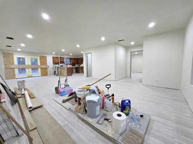 a view of livingroom with furniture and toys