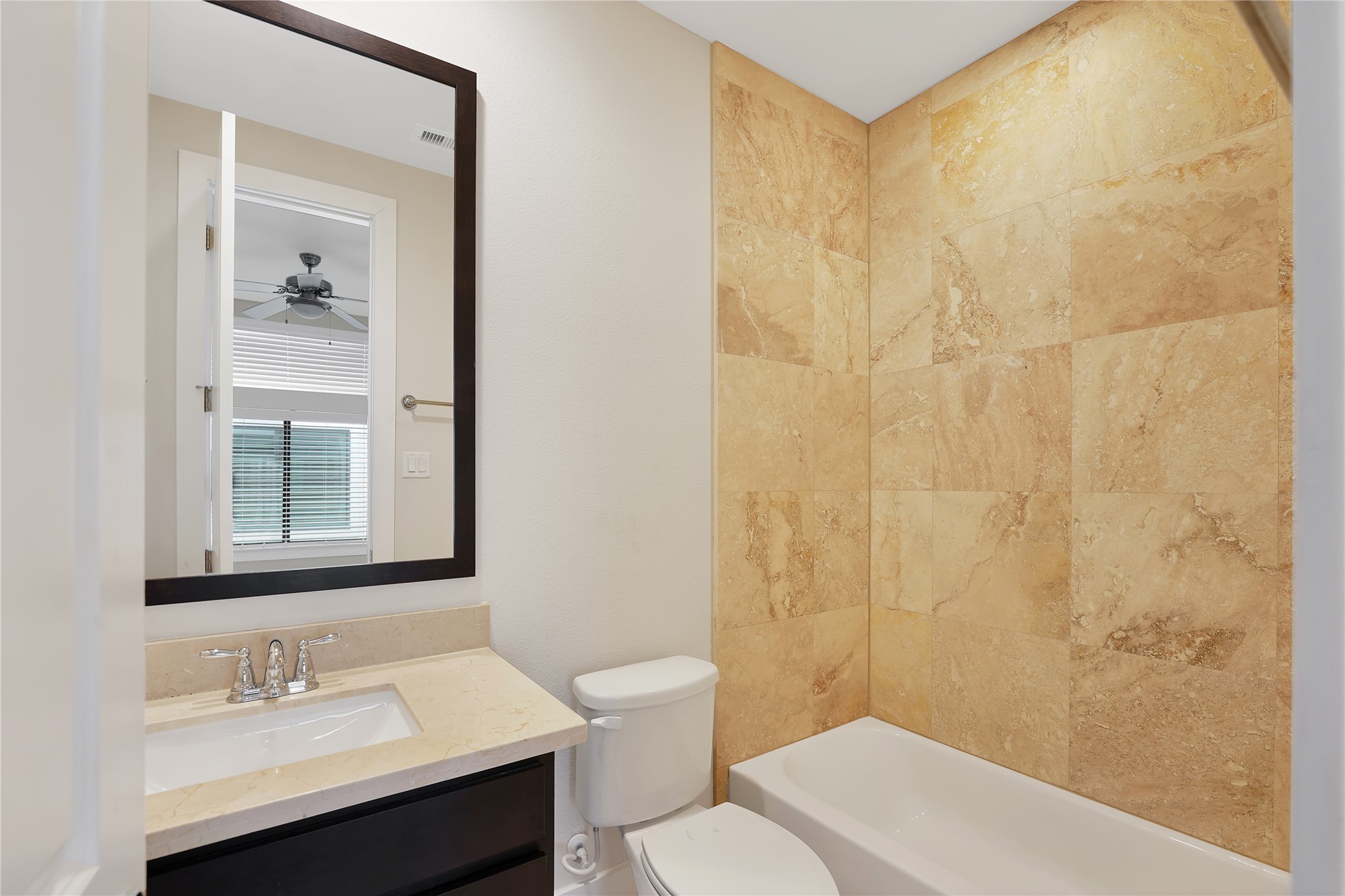 1810 Thompson Street Houston, TX 77007 - Photo 19 of 20 a bathroom with a sink and a mirror