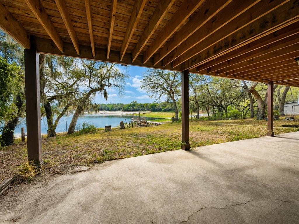 7119 Immokalee Road Keystone Heights, FL 32656 - Photo 41 of 50 a view of a backyard of the house