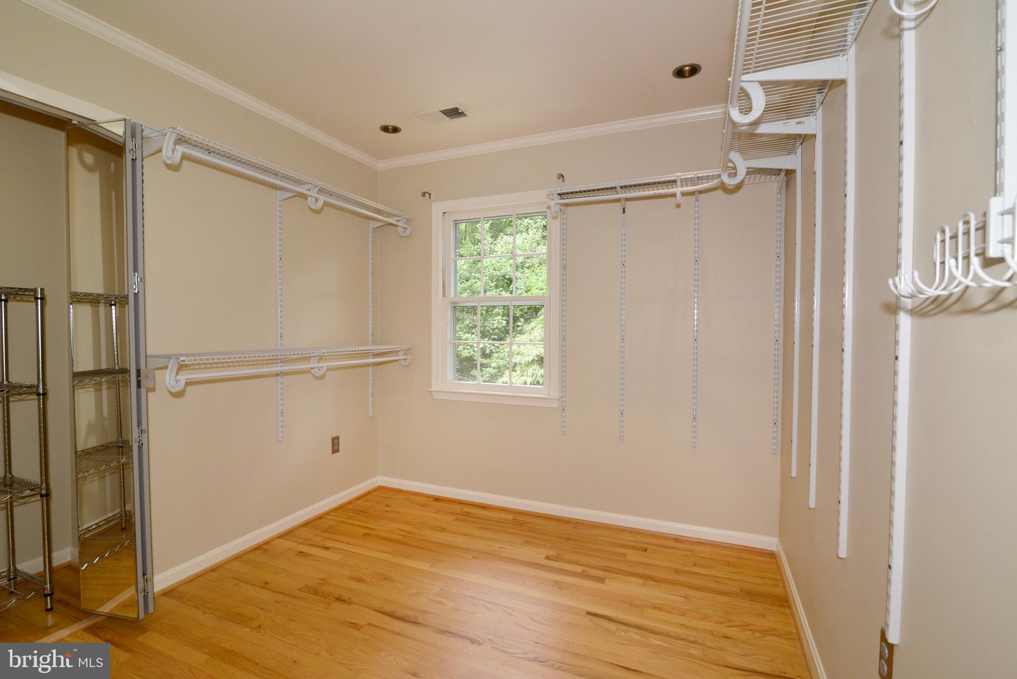 11480 Bingham Terrace Reston, VA 20191 - Photo 31 of 48 Owner''s Suite Closet with hardwoods & great space