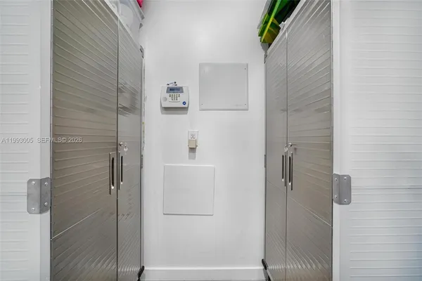 a kitchen with granite countertop a sink and a window