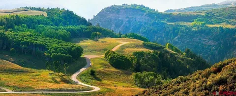 a view of an outdoor space and mountain view