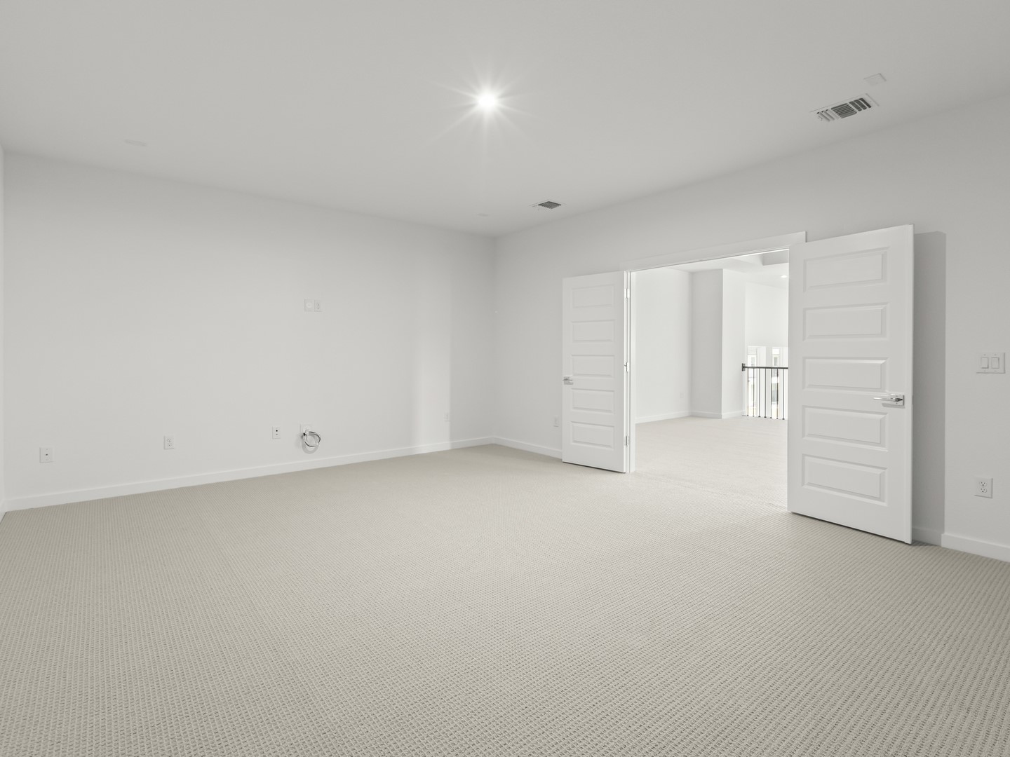 2508 Chiavari Way Leander, TX 78641 - Photo 17 of 24 Spacious room with new carpeting and double doors, perfect for flexible living.
