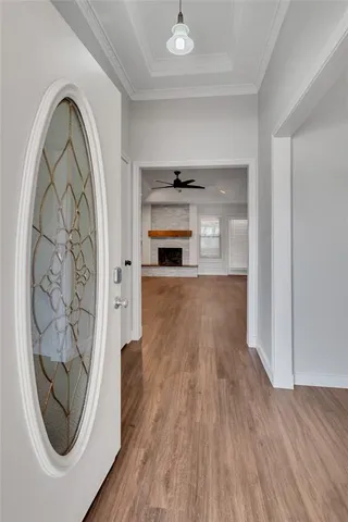 a view of a livingroom with wooden floor