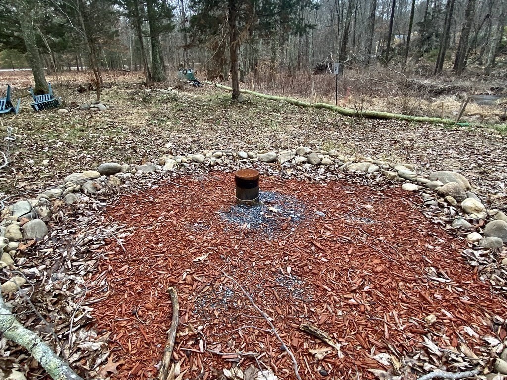 24 Danforth Street Rehoboth, MA 02769 - Photo 8 of 13 a backyard of a house with lots of green space