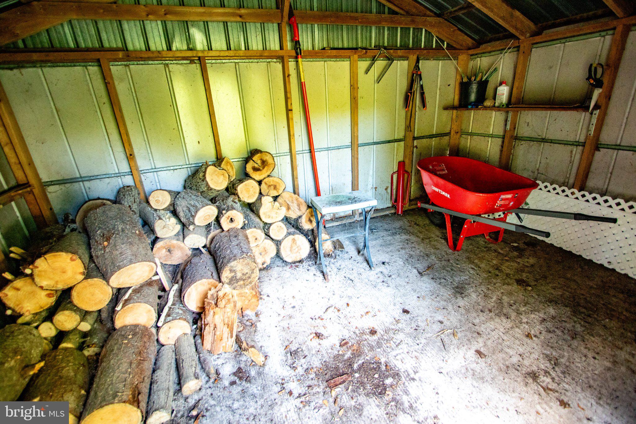 2056 Ridge Road Elverson, PA 19520 - Photo 57 of 89 Cozy shed with stacked firewood