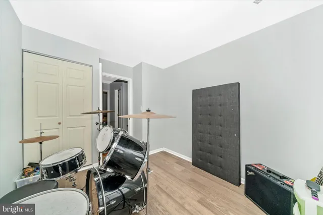 a bedroom with a bed and furniture