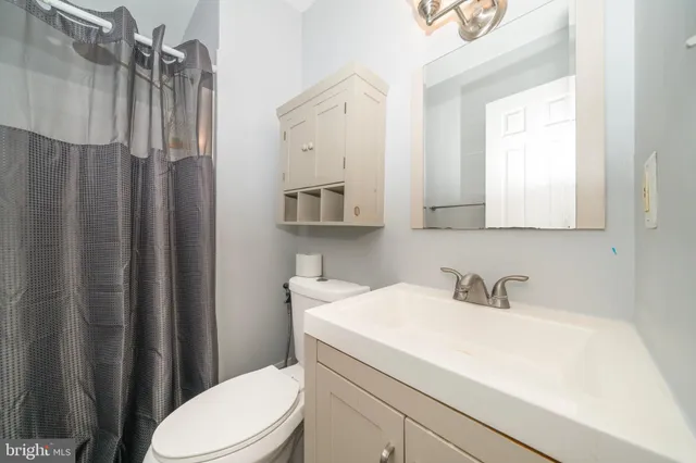 a bedroom with furniture and window