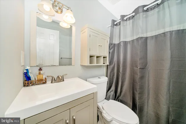 a bed room with a bed and a couch