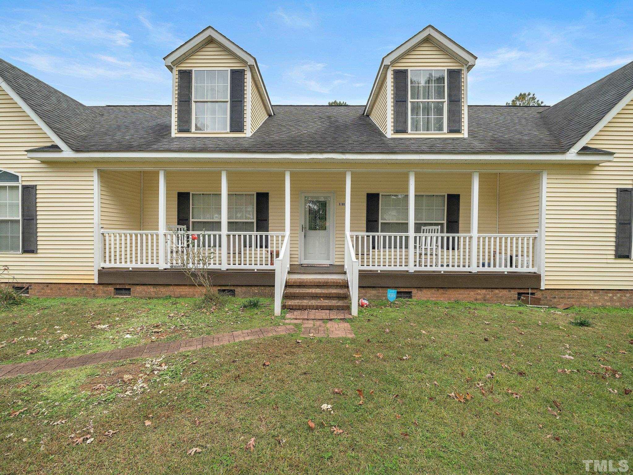 5169 Crabtree Road Nashville, NC 27856 - Photo 2 of 18 a front view of a house with a yard