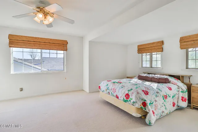 a bathroom with a sink vanity granite and toilet