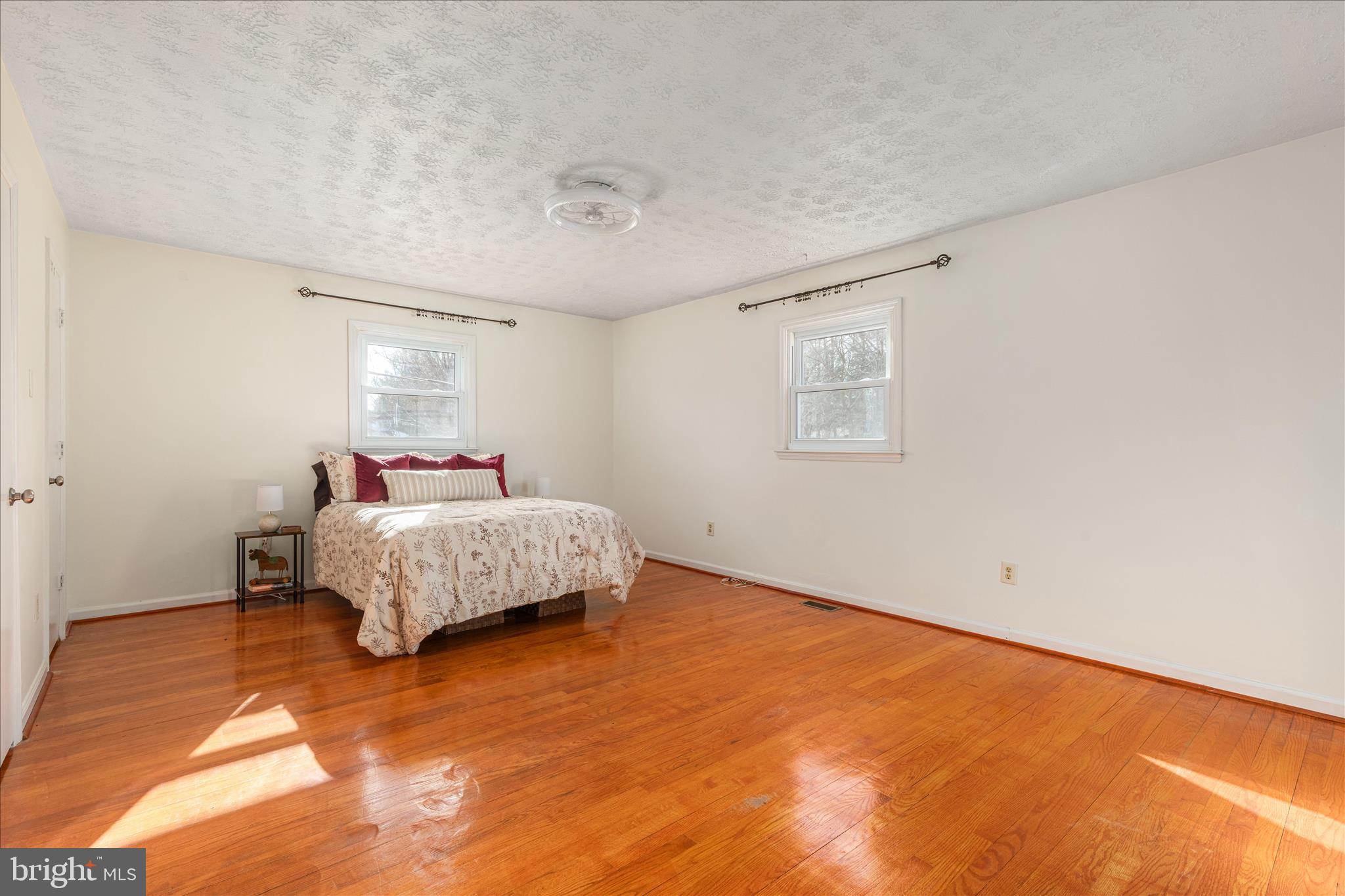 113 Williamson Road Winchester, VA 22602 - Photo 11 of 52 a bedroom with a bed and a night stand