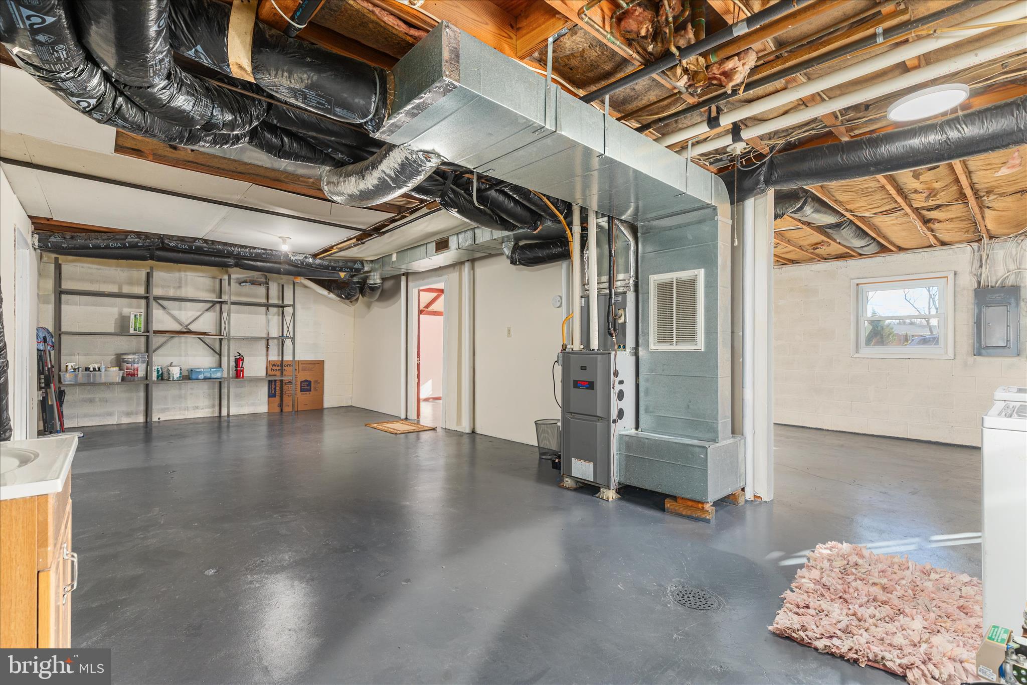113 Williamson Road Winchester, VA 22602 - Photo 28 of 52 a view of empty room with wooden floor and windows