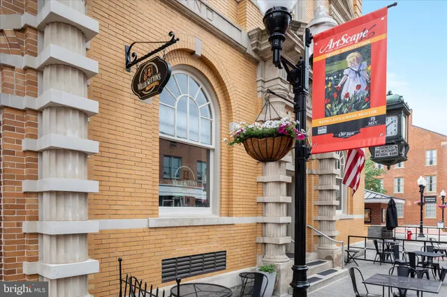 a view of street with sitting area