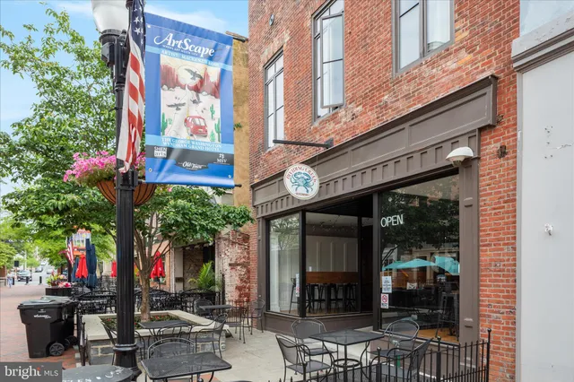 a front view of a building with a entrance door