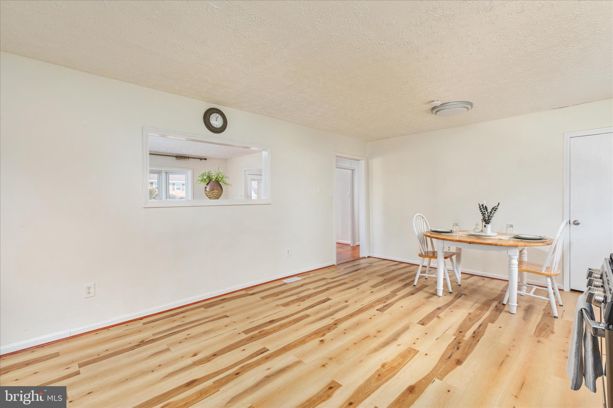 113 Williamson Road Winchester, VA 22602 - Photo 7 of 52 a bedroom with a bed and a table in it