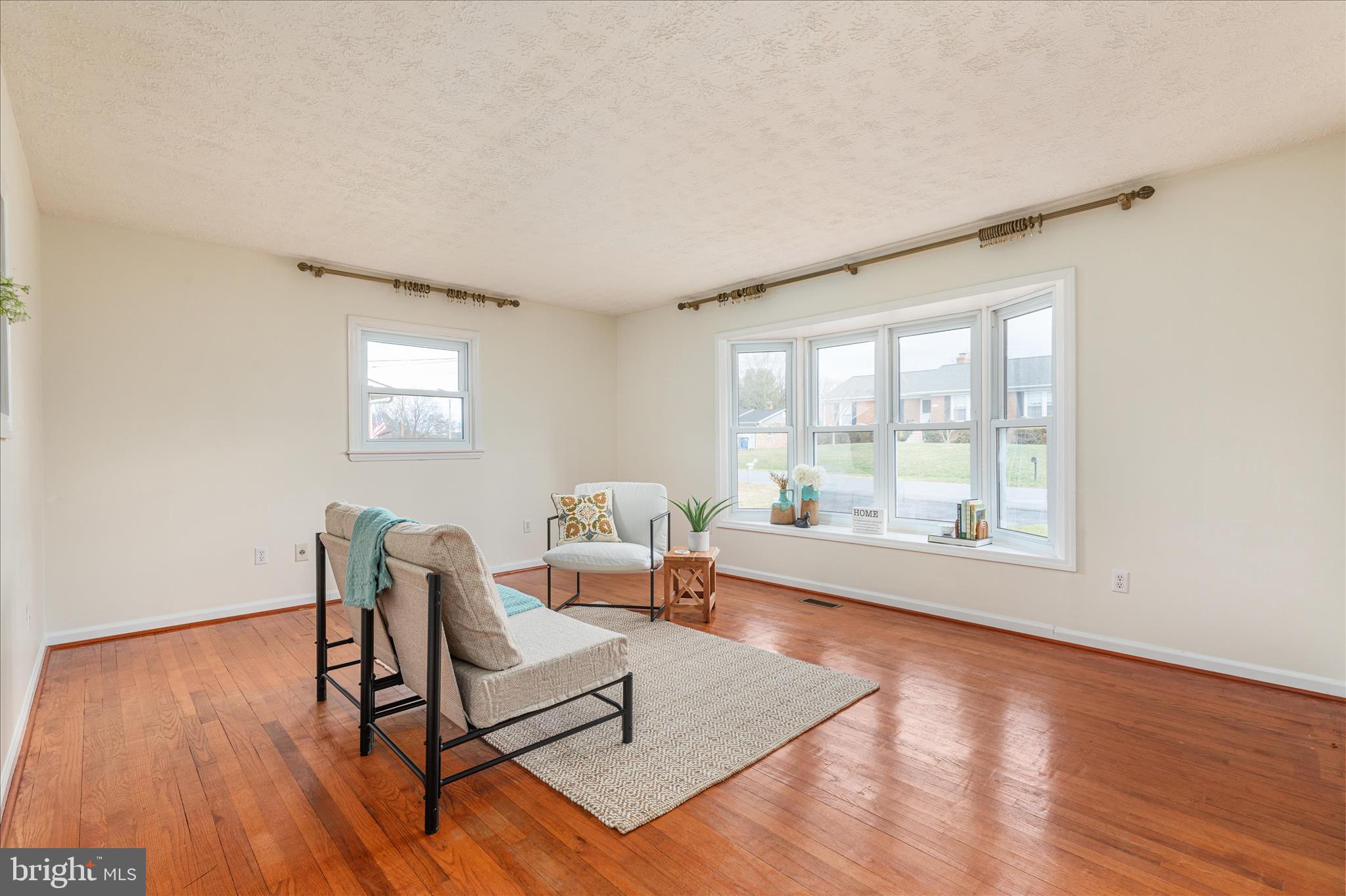 113 Williamson Road Winchester, VA 22602 - Photo 8 of 52 a living room with furniture and a large window