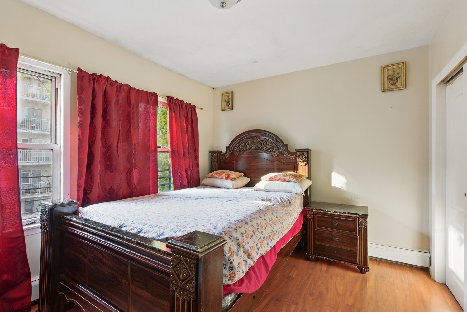 2517 Boston Road Bronx, NY 10467 - Photo 9 of 11 a bedroom with a bed and wooden floor