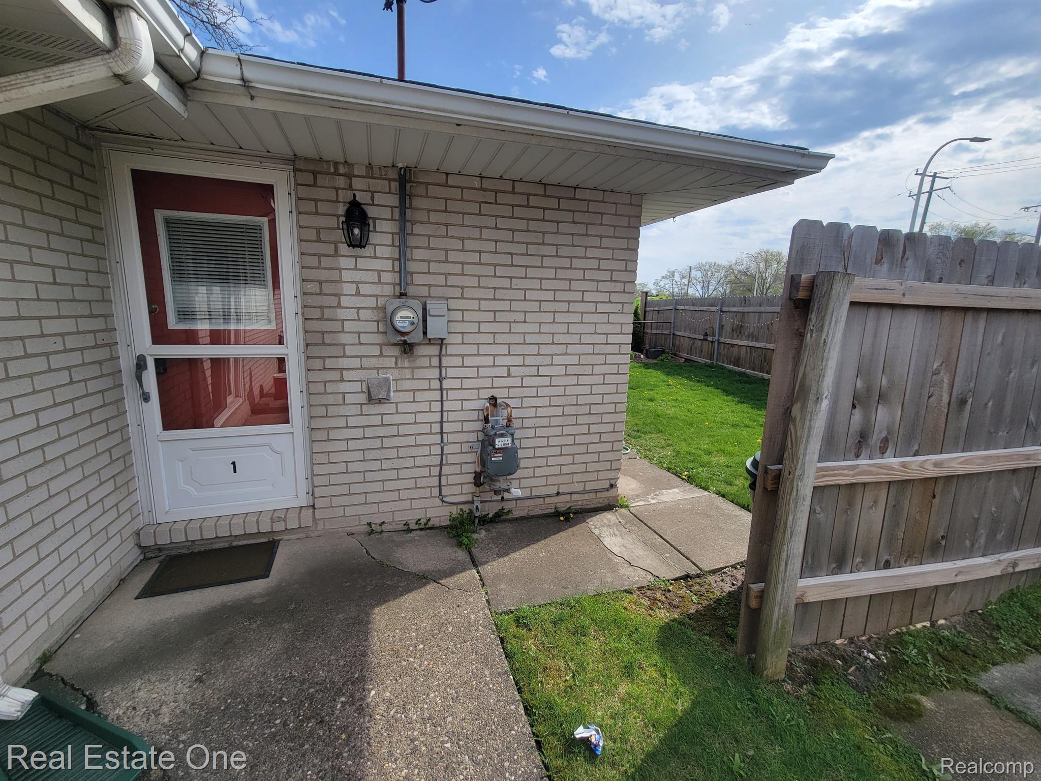 308 North Rochester Road, Unit 1 Clawson, MI 48017 - Photo 22 of 22 Side entry to kitchen/ rear of unit