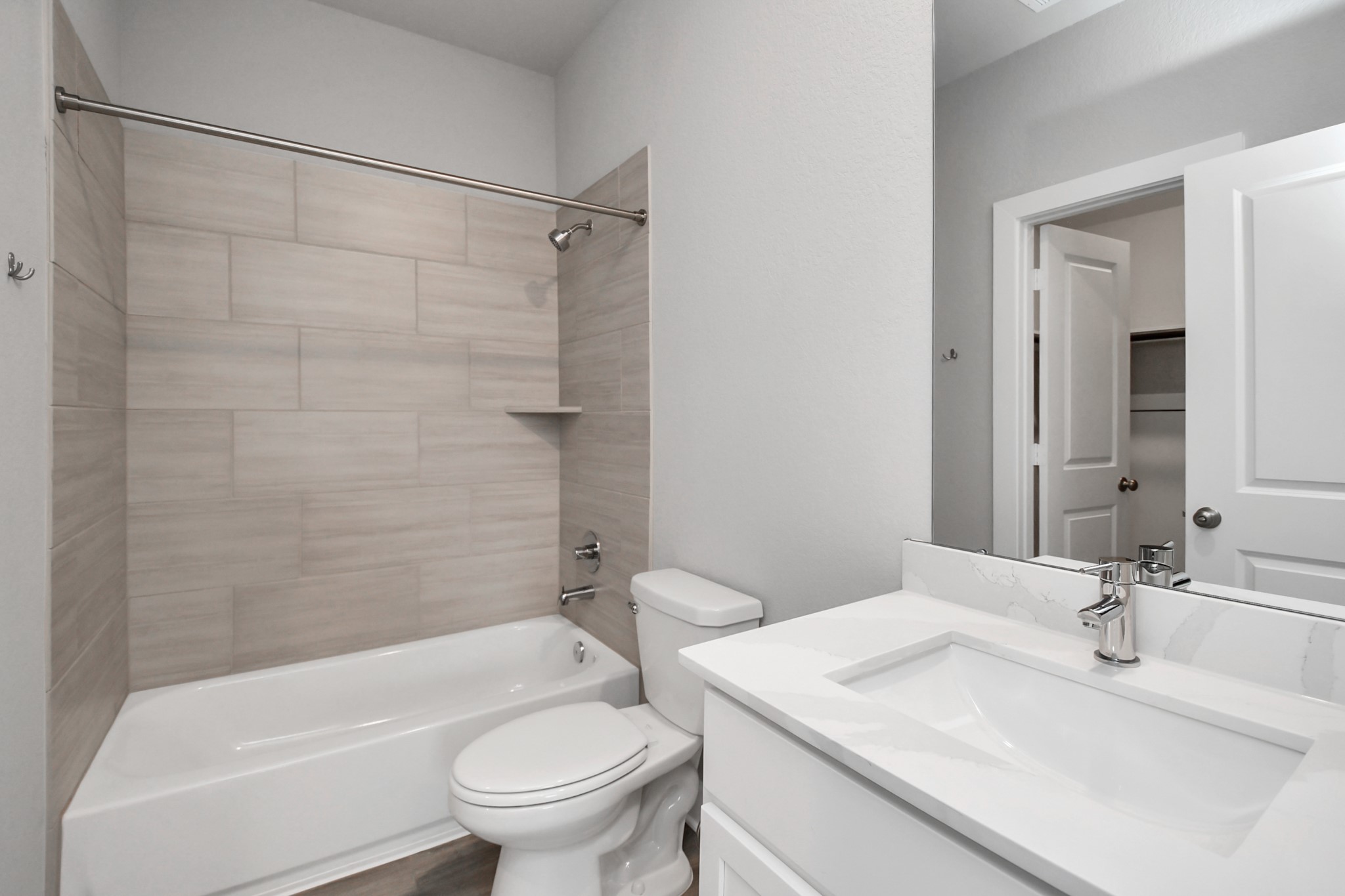 7514 Terramar Bay Lane Cypress, TX 77433 - Photo 13 of 23 a bathroom with a sink a toilet and a bathtub