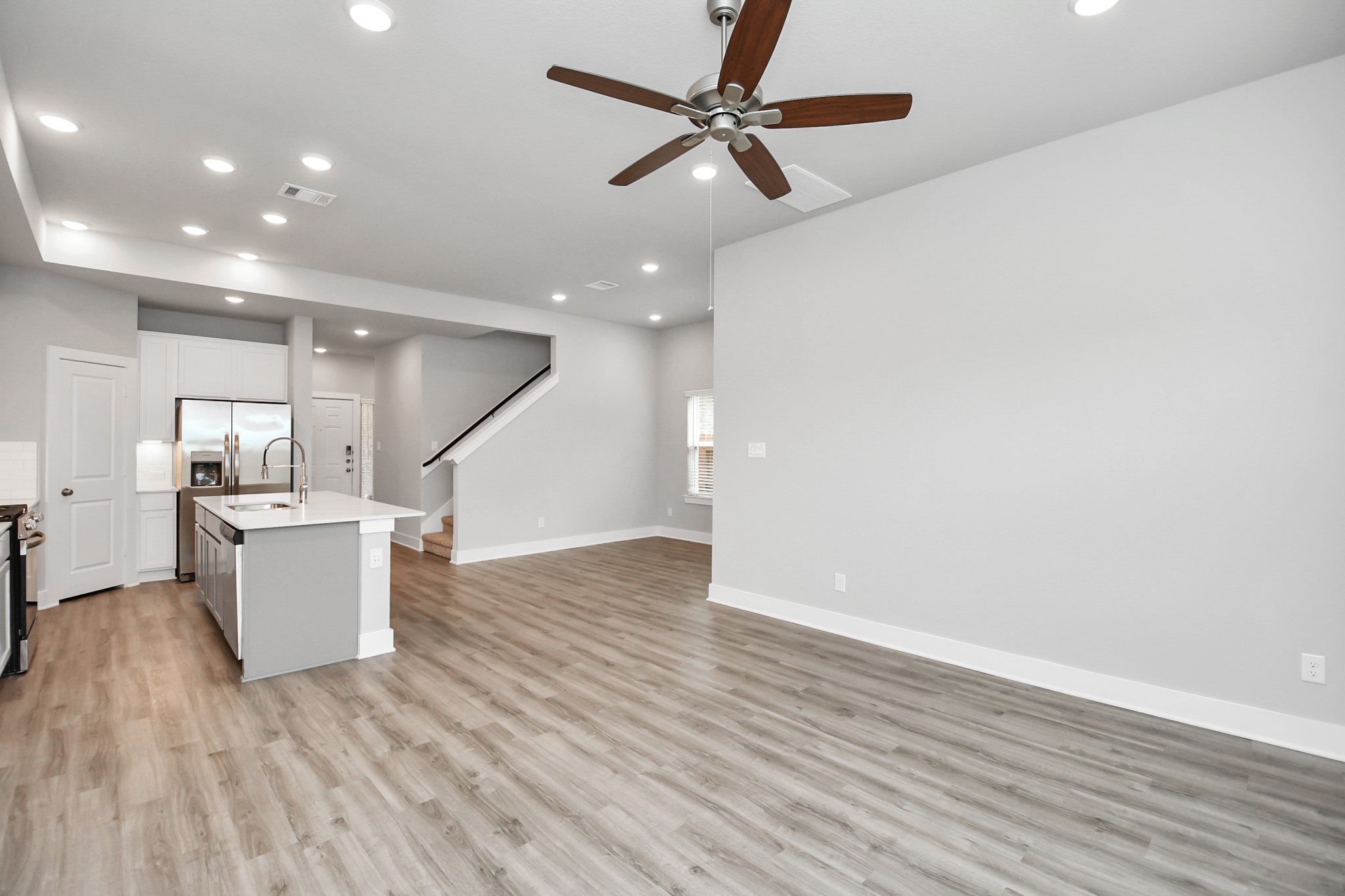 7514 Terramar Bay Lane Cypress, TX 77433 - Photo 5 of 23 a view of a kitchen with a sink and a window
