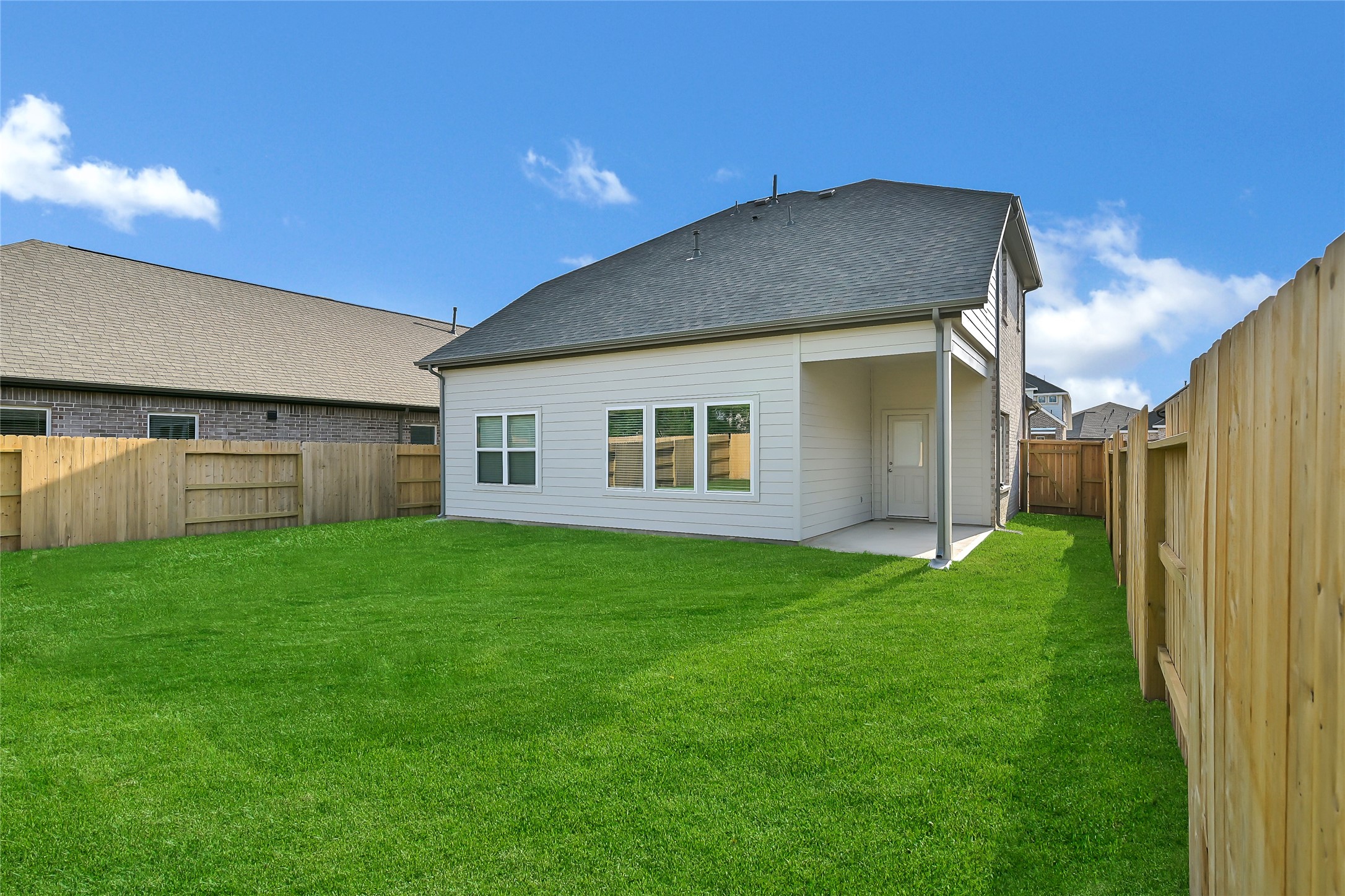 7514 Terramar Bay Lane Cypress, TX 77433 - Photo 8 of 23 a backyard of a house with green space