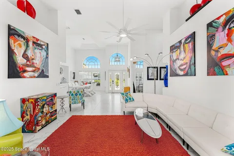 a bedroom with furniture and a wooden floor