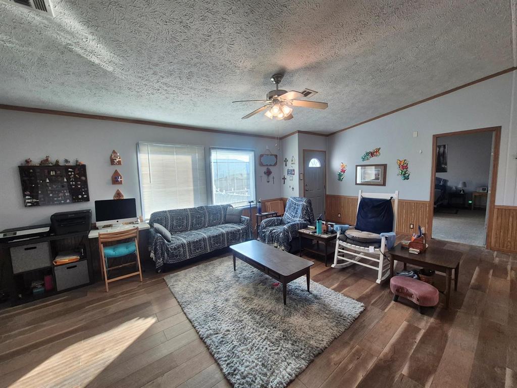438 Silver River Road Gholson, TX 76705 - Photo 24 of 39 a living room with furniture and a rug