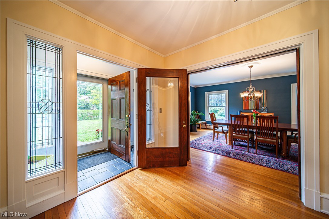 2868 Lee Road Cleveland, OH 44120 - Photo 3 of 35 Hardwood floored entryway featuring plenty of natural light and crown molding