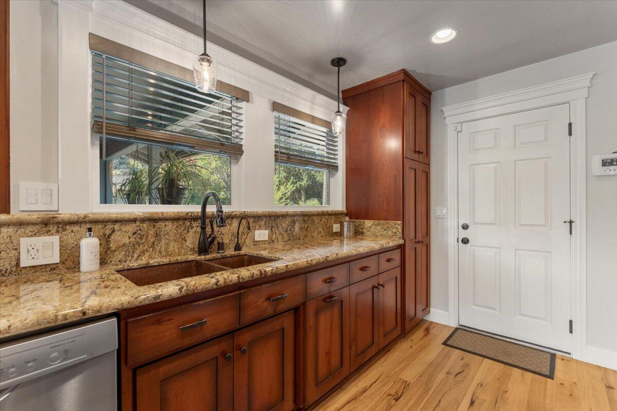 3301 Riverside Drive Anderson, CA 96007 - Photo 11 of 27 a bathroom with a granite countertop sink and a window