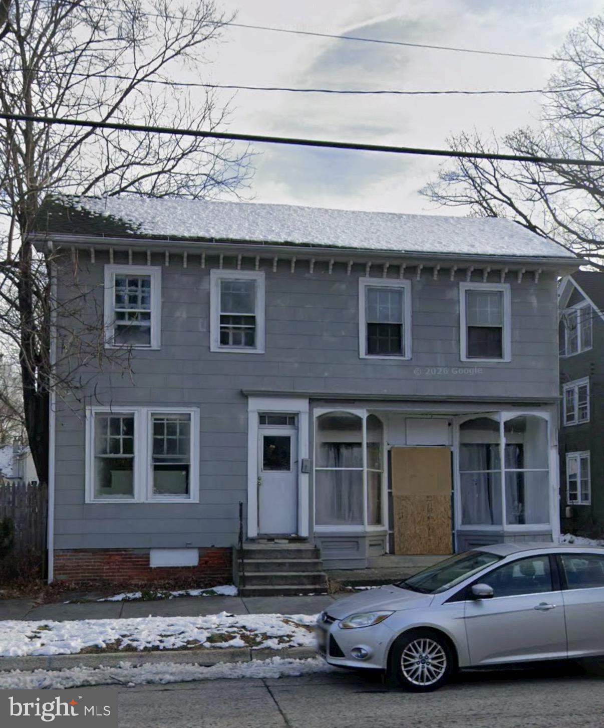 296 East Broadway Salem, NJ 08079 - Photo 1 of 1 a front view of a house with a garage