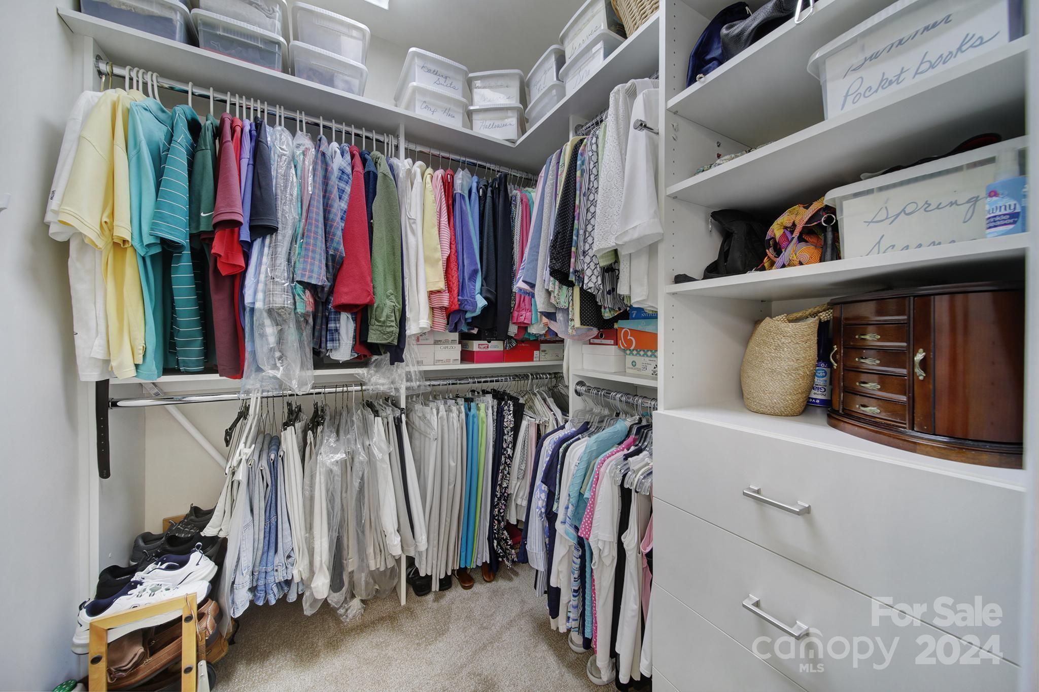 3055 Everett Lane Fort Mill, SC 29707 - Photo 20 of 40 a view of walk in closet with clothes and shoes