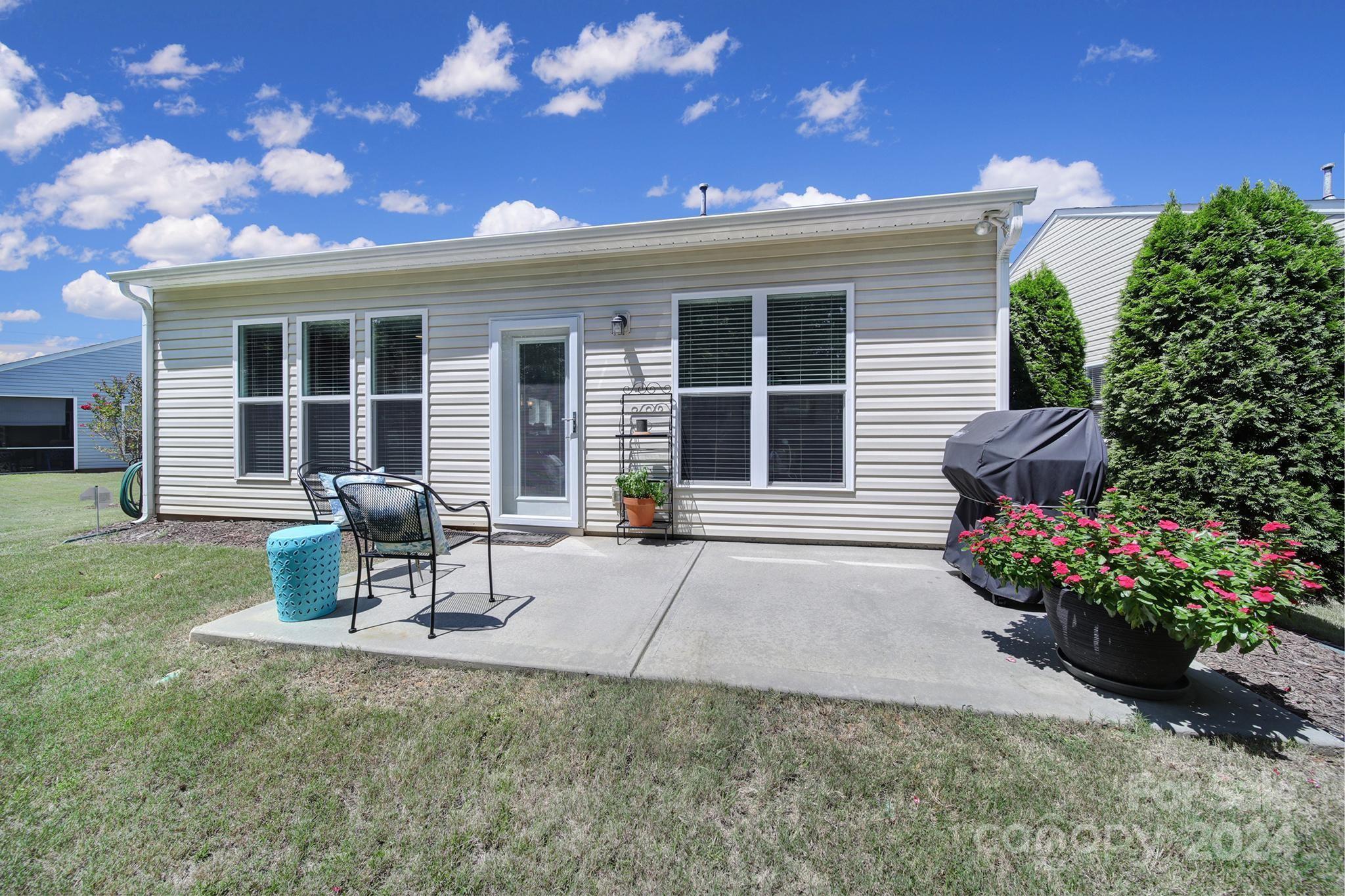 3055 Everett Lane Fort Mill, SC 29707 - Photo 23 of 40 a house view with a sitting space and garden