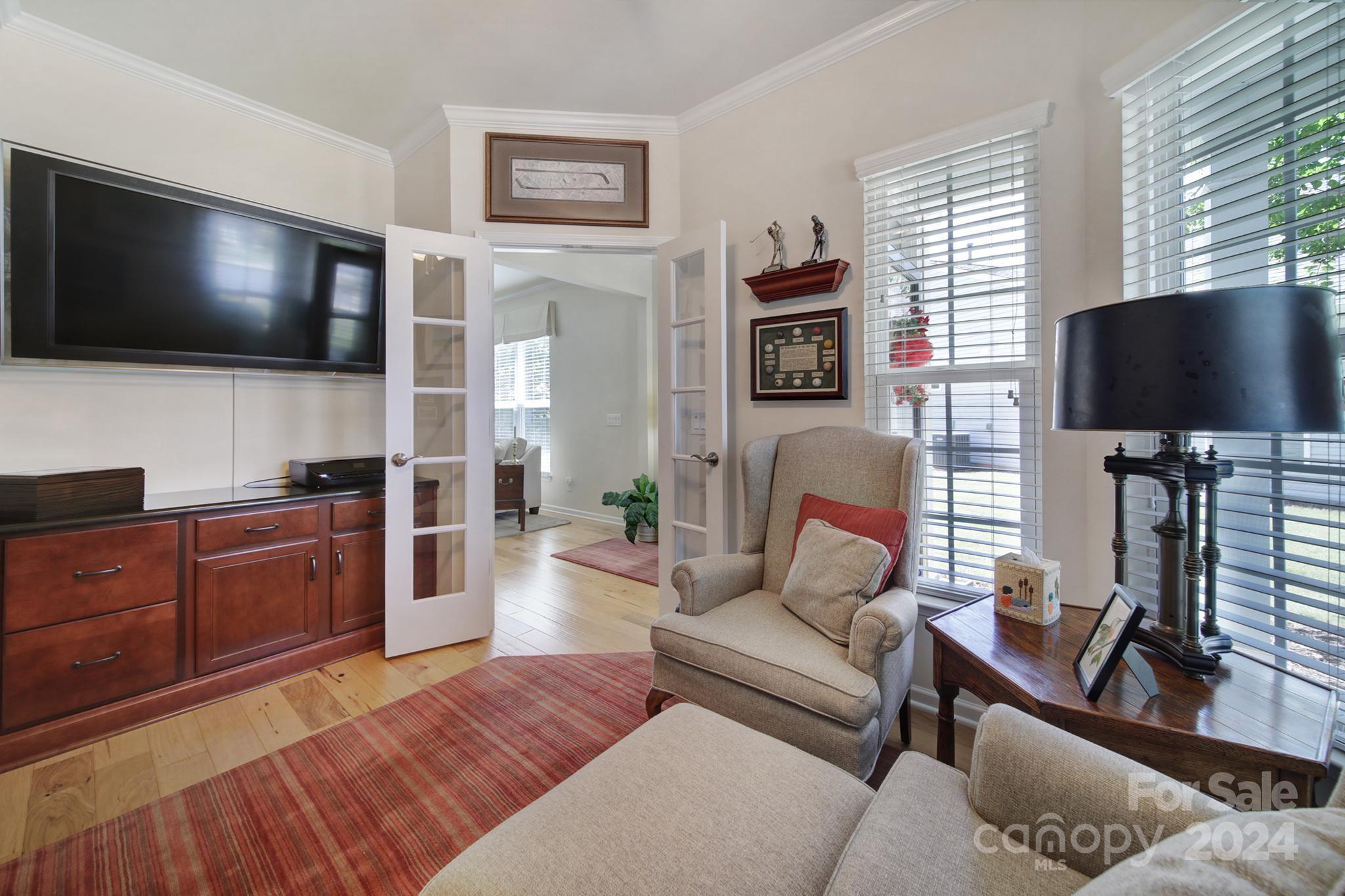 3055 Everett Lane Fort Mill, SC 29707 - Photo 5 of 40 a living room with furniture and a flat screen tv