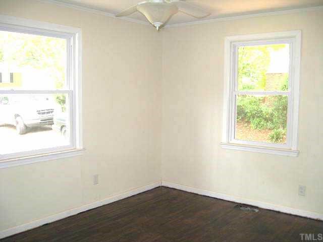 2320 Stevens Road Raleigh, NC 27610 - Photo 5 of 10 an empty room with a window