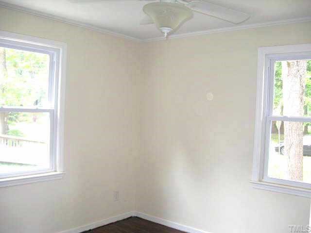 2320 Stevens Road Raleigh, NC 27610 - Photo 8 of 10 an empty room with a window