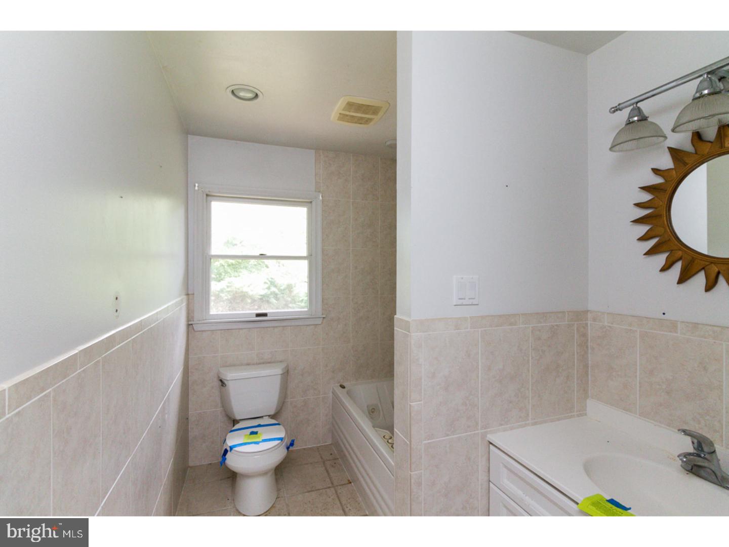 126 Buddtown Road Southampton, NJ 08088 - Photo 12 of 21 a bathroom with a toilet and a shower