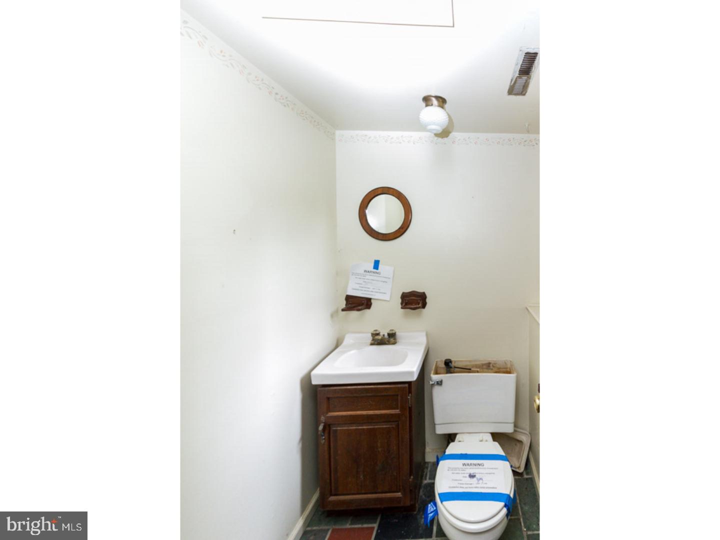126 Buddtown Road Southampton, NJ 08088 - Photo 15 of 21 a bathroom with a sink toilet and vanity