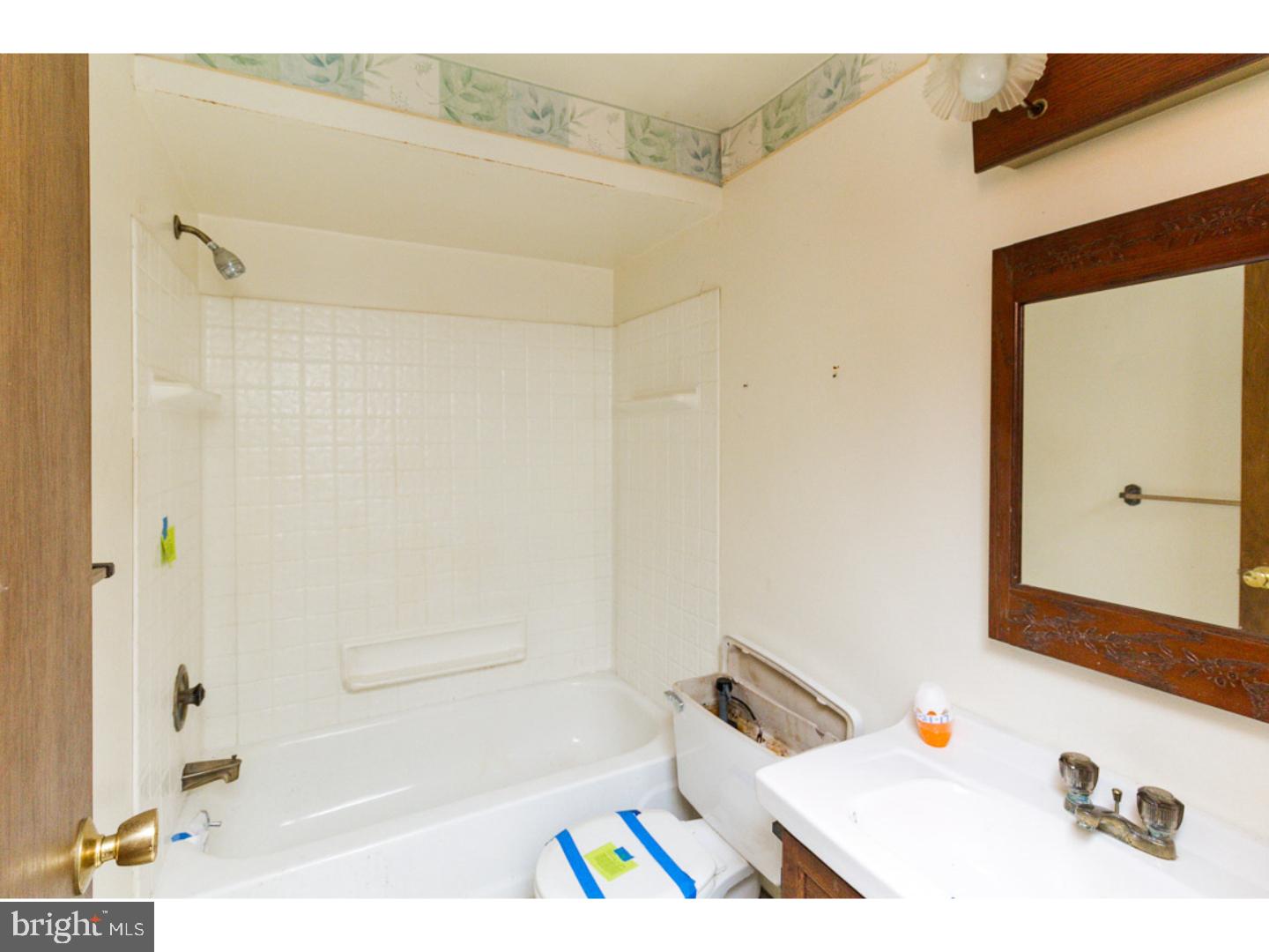 126 Buddtown Road Southampton, NJ 08088 - Photo 16 of 21 a bathroom with a bathtub and a shower