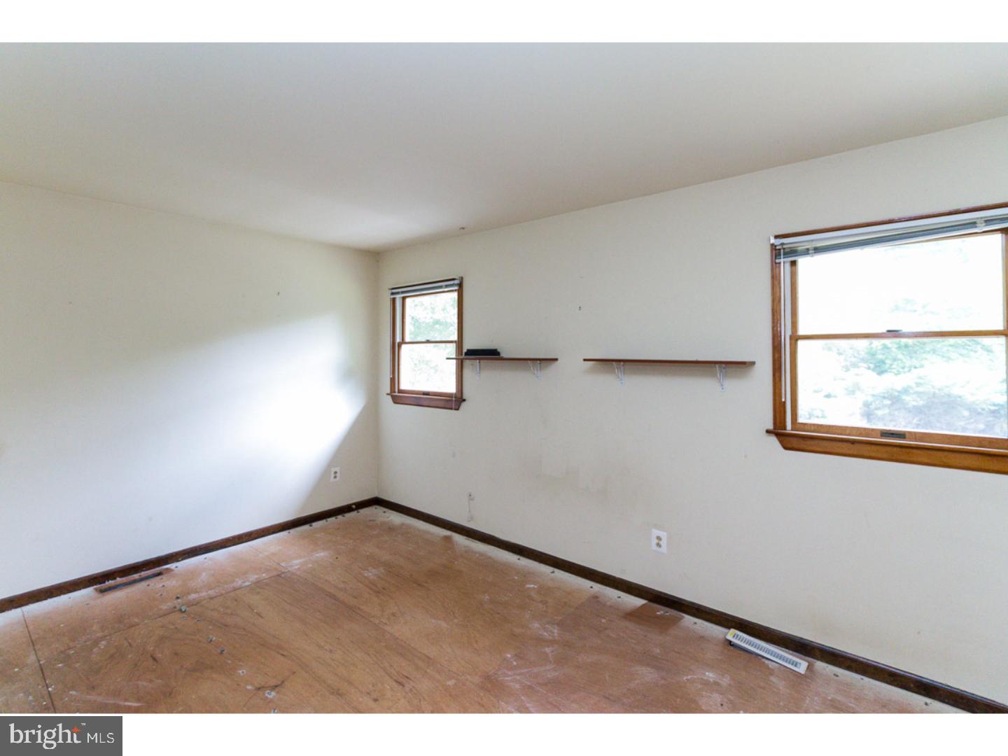 126 Buddtown Road Southampton, NJ 08088 - Photo 6 of 21 an empty room with windows