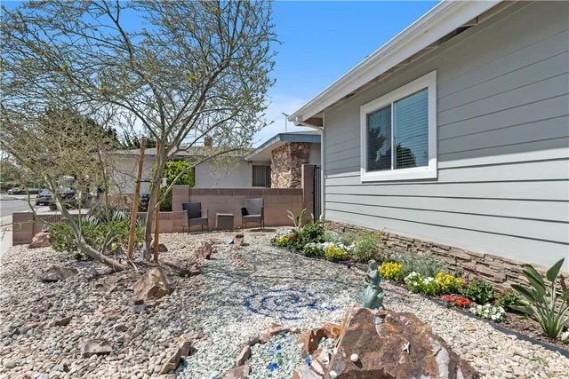 a house view with a backyard space