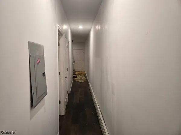a view of a hallway with a glass door